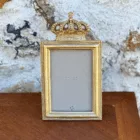 Cadre royal en verre et contour or