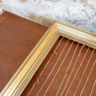 Cadre vintage doré à cordelettes