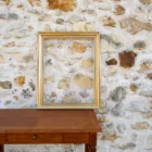 Cadre vintage doré à cordelettes