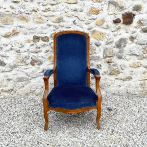 Fauteuil Voltaire bleu velours