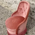 Fauteuil crapaud rose capitonné à franges
