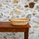 Panier vintage en osier ovale à poignées bois
