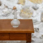 Soliflore vintage en verre transparent sur pied
