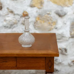 Soliflore vintage en verre transparent sur pied