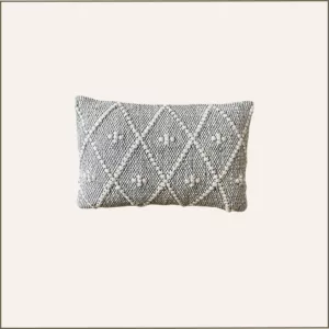 Coussin rectangulaire crème et noir 50x30