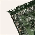 Tapis vert crème et noir